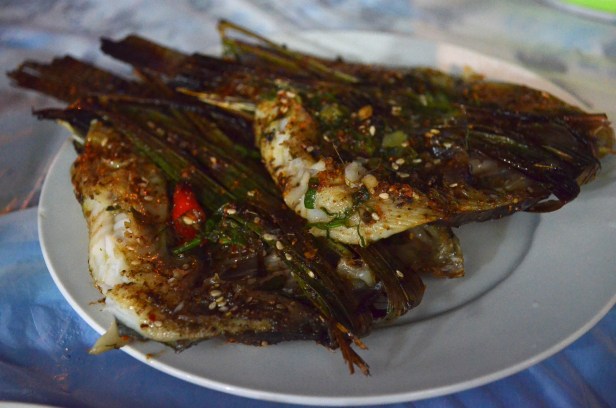 House of Haos Xishuangbanna Yunnan BBQ grilled fish sweet grass