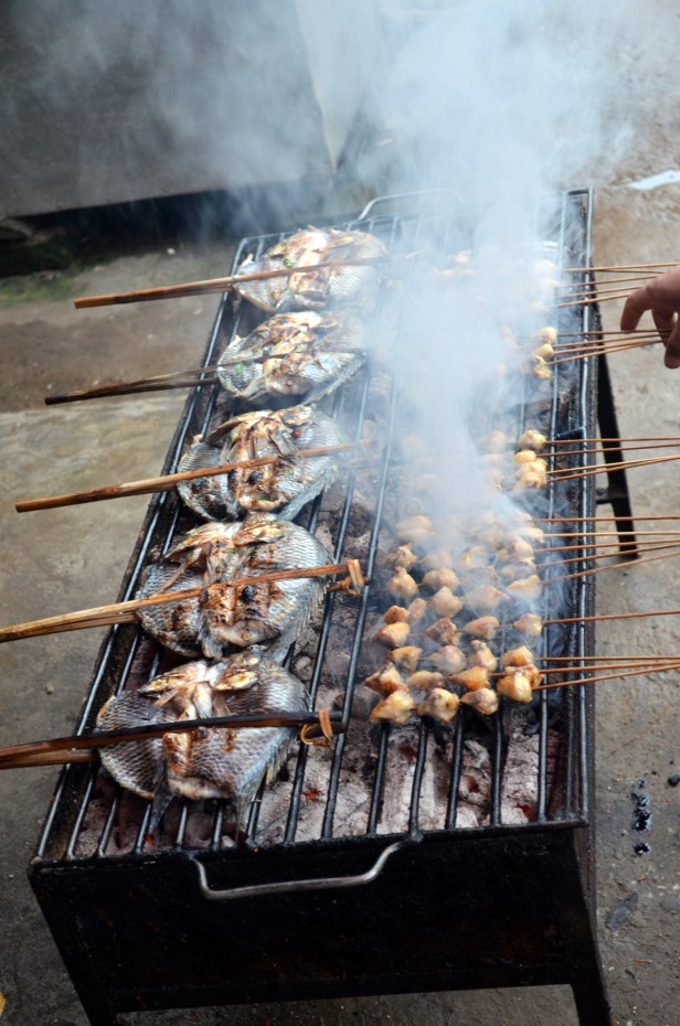 House of Haos Xishuangbanna Menghai Aini Village Market Grilling Fish